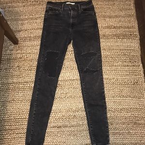 Levi’s “Mile High Super Skinny” black ripped jeans